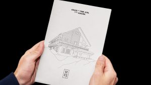 House of Finn Juhl catalogue held in a hand