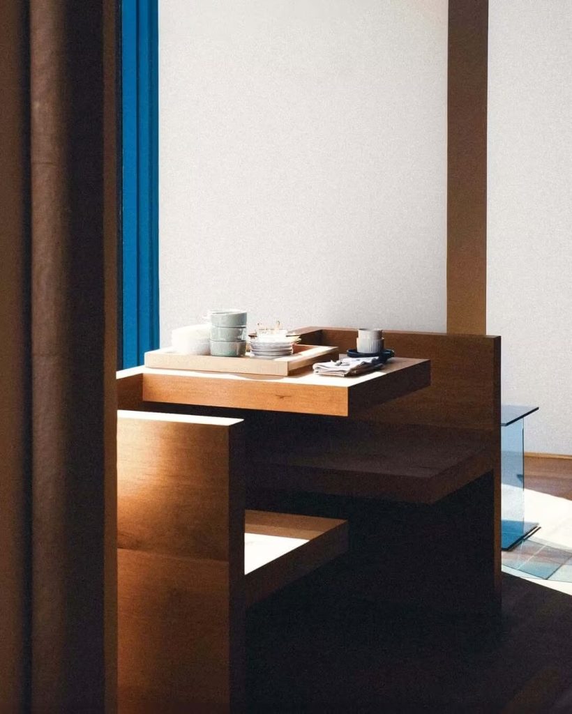 Studio X furniture art direction with warm materials and colour